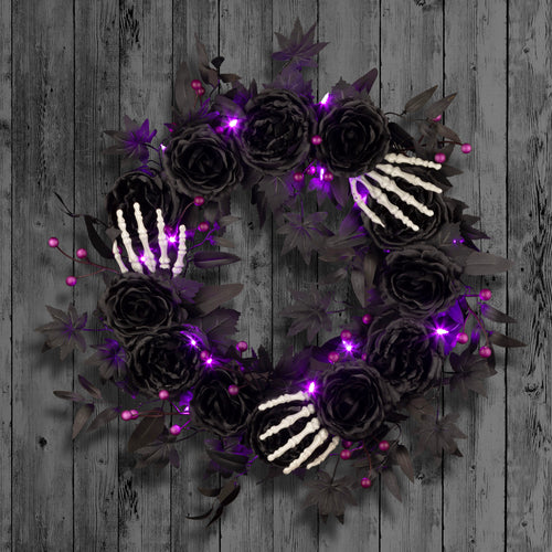 24 in. Artificial Bad to the Bone Halloween Wreath, 30 Purple LED Lights, Battery Operated, Timer